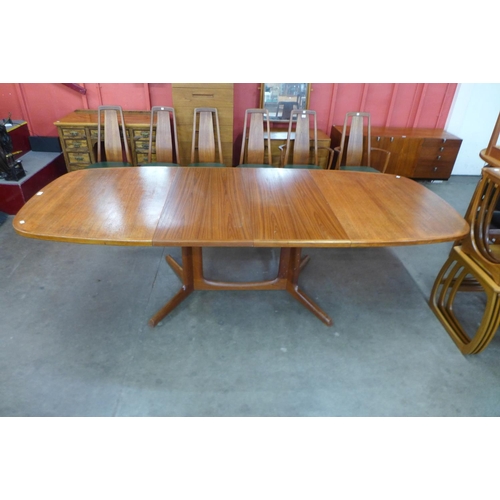 11 - A Danish Gudme Mobelfabrik teak extending dining table