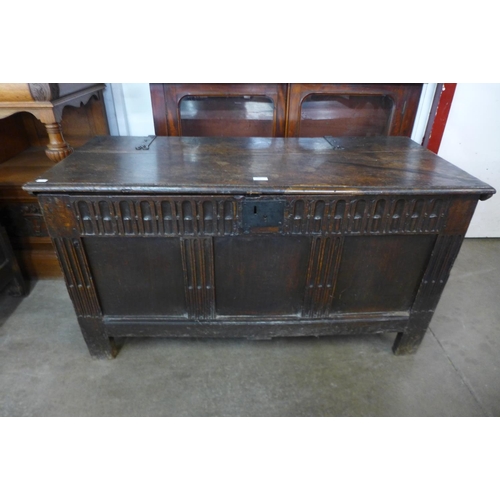 134 - A William III carved oak coffer