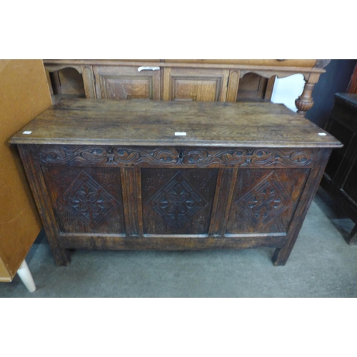 135 - A William III carved oak coffer