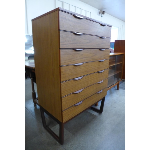 20 - A Europa teak chest of drawers