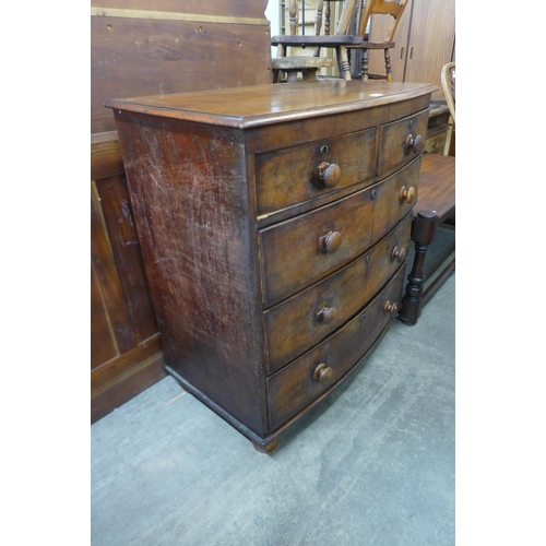 201 - A Victorian mahogany bow front chest of drawers