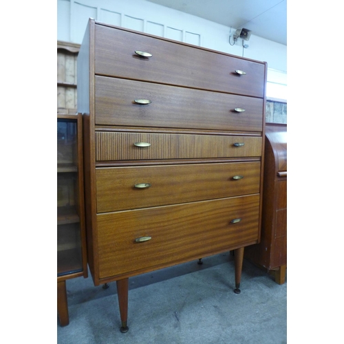 22 - A teak chest of drawers