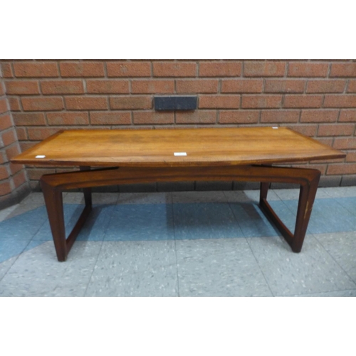 26 - A Remploy floating top teak coffee table