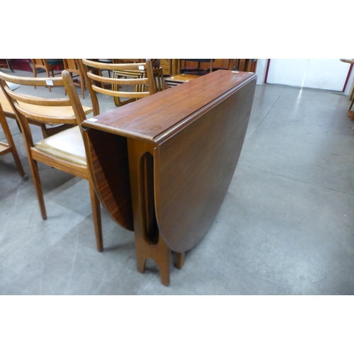 27 - A McIntosh teak drop-leaf table