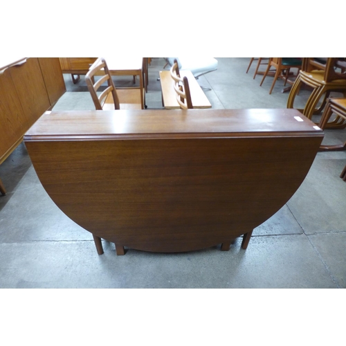 27 - A McIntosh teak drop-leaf table