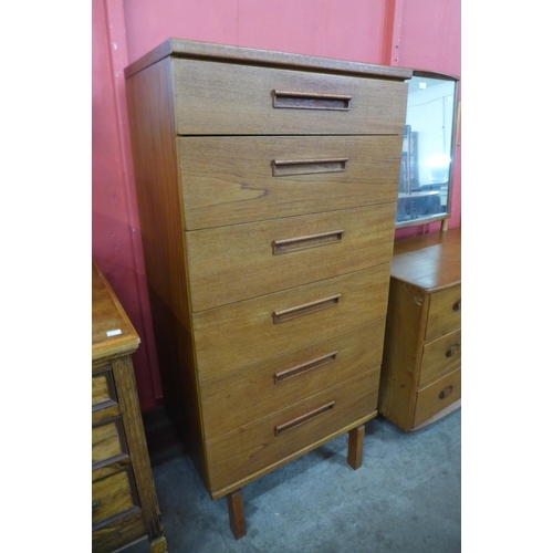 3 - An Austin Suite teak chest of drawers