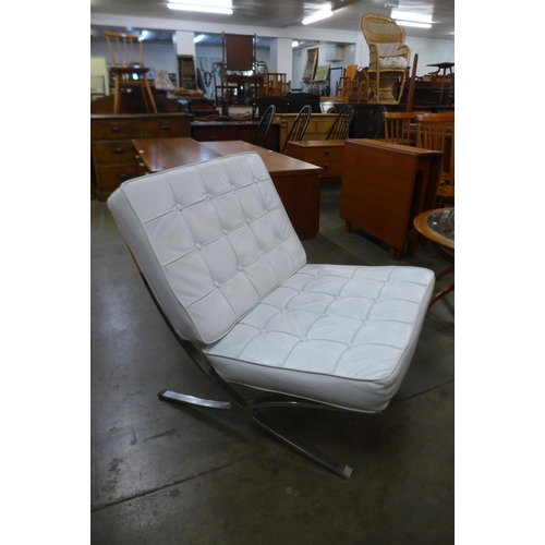 34 - A Barcelona style white leather and chrome chair