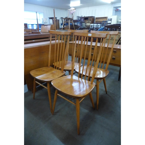 38 - A set of four Ercol elm and beech 608 model chairs