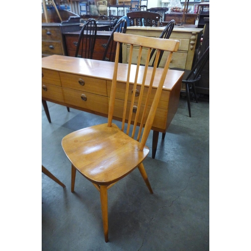 38 - A set of four Ercol elm and beech 608 model chairs