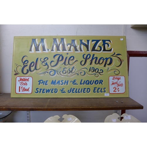 382 - A painted wooden M. Manze Eel & Pie Shop sign