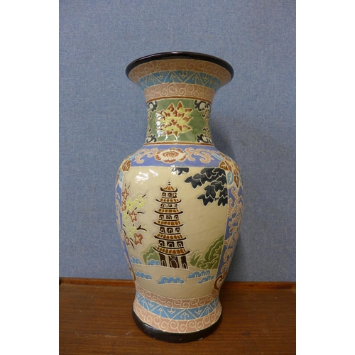 384 - An oriental porcelain vase