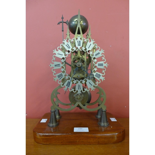 393 - A brass fusee skeleton clock