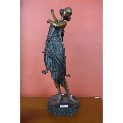 395 - An Art Deco style bronze figure of a lady