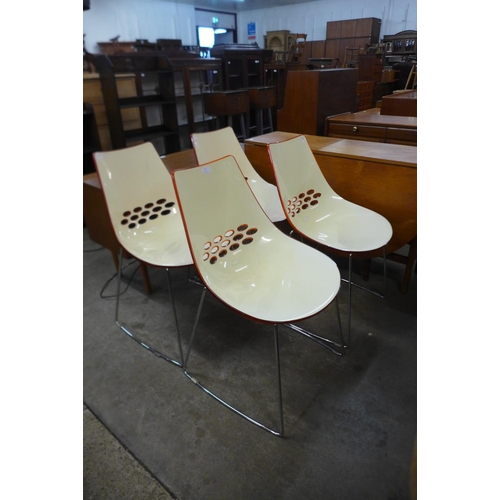 45 - A set of four Italian Caligaris JAM chrome and cream/orange perspex chairs