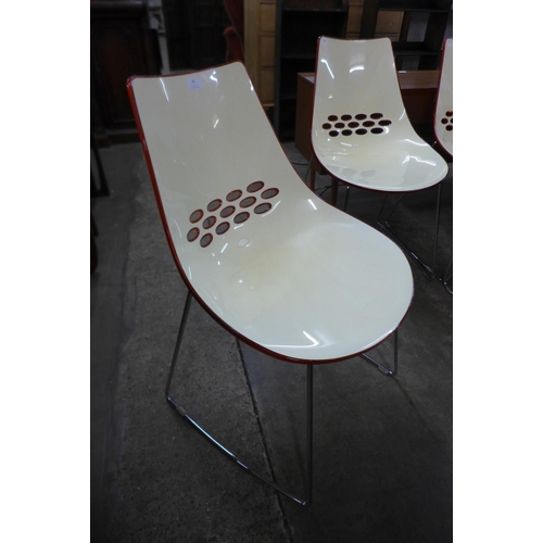 45 - A set of four Italian Caligaris JAM chrome and cream/orange perspex chairs