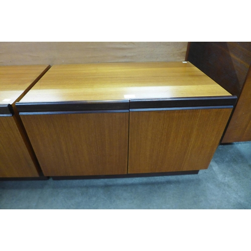 50 - A small G-Plan teak two door cupboard