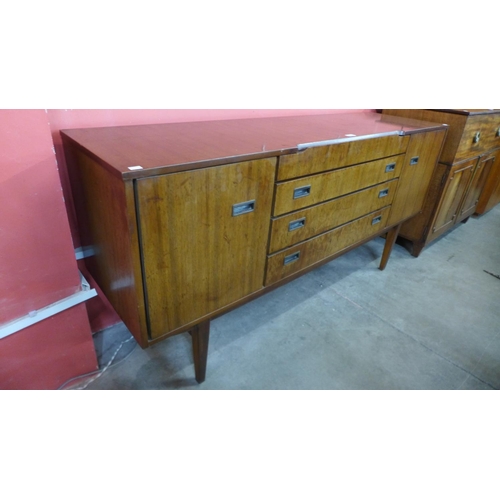 55 - A Beautility tola wood sideboard