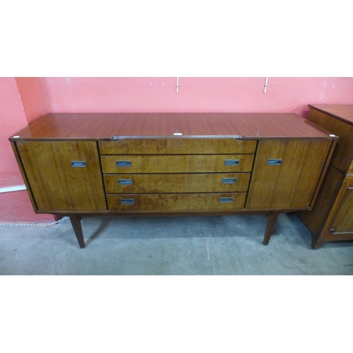 55 - A Beautility tola wood sideboard