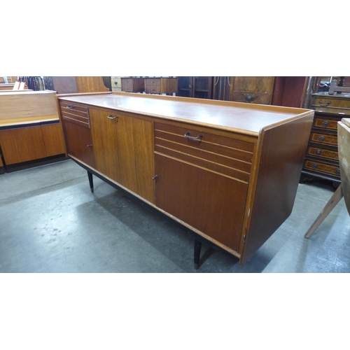 56 - A teak sideboard