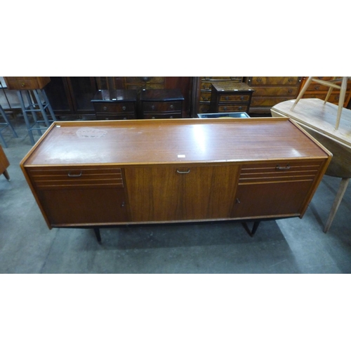 56 - A teak sideboard