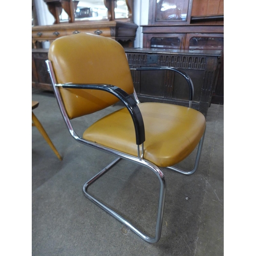 66 - A Bauhaus style tubular steel and leather cantilever armchair