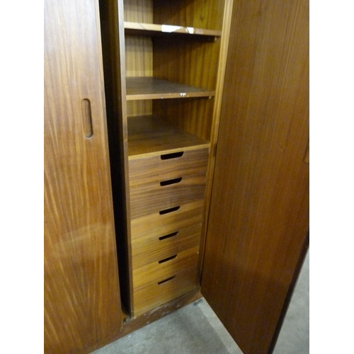 67 - A teak three piece bedroom suite, retailed by Heals of London