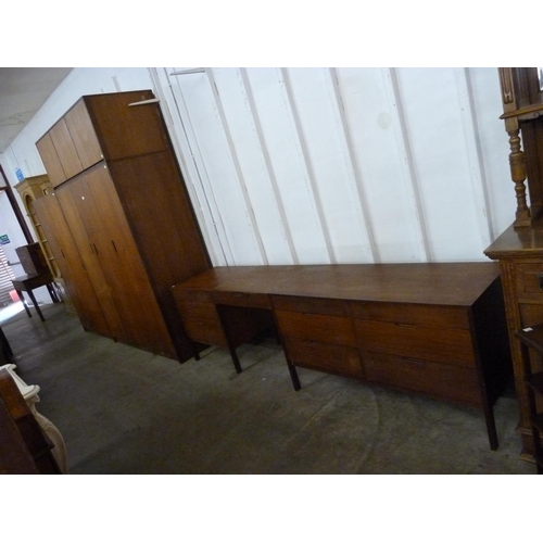 67 - A teak three piece bedroom suite, retailed by Heals of London