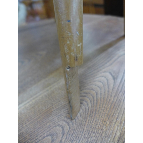 72 - An Ercol Blonde elm and beech drop-leaf table and a Goldsmith chair