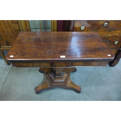 94 - A George IV mahogany fold over games table