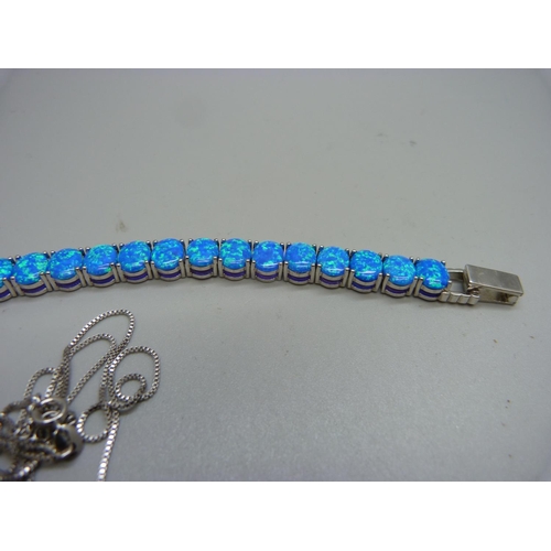 1002 - A silver and synthetic opal bracelet and a similar pendant with chain