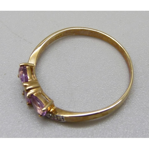 1063 - A 9ct gold, white zircon and pink sapphire ring, 2.2g, U