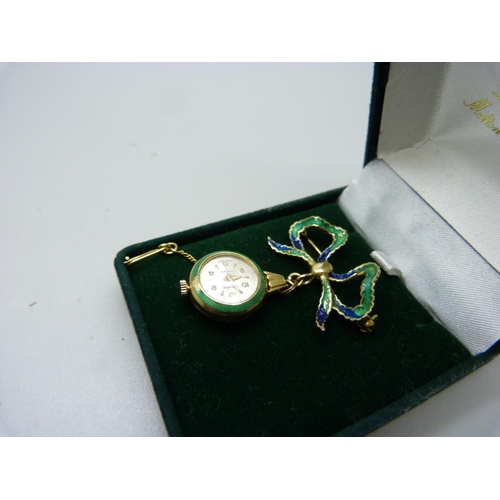 1071 - A gold and enamel nurse's brooch watch, marked 750