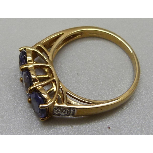 1082 - A 9ct gold, iolite and diamond ring, 3.2g, N