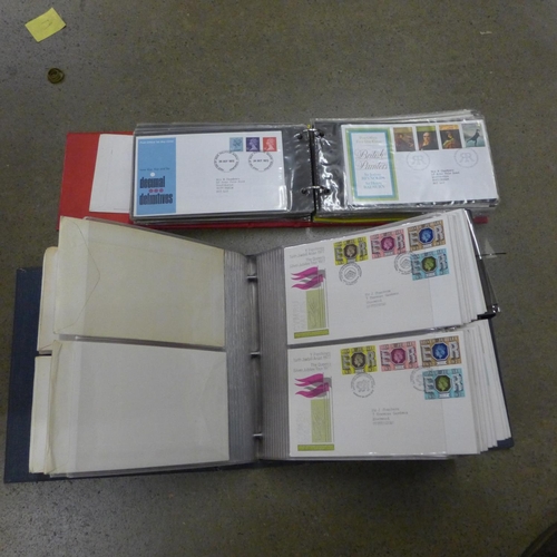 1107 - Stamps comprising two albums of first day covers and mint stamps, and a collection of loose stamps *... 