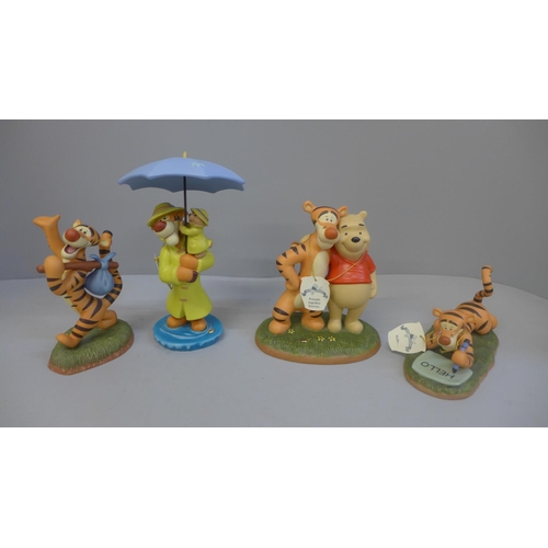 604 - Four Winnie The Pooh figures, Hello...., Friends Together Forever, Ta-Ta For Now and Your Smile Is M... 