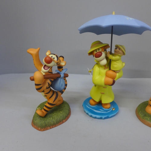 604 - Four Winnie The Pooh figures, Hello...., Friends Together Forever, Ta-Ta For Now and Your Smile Is M... 