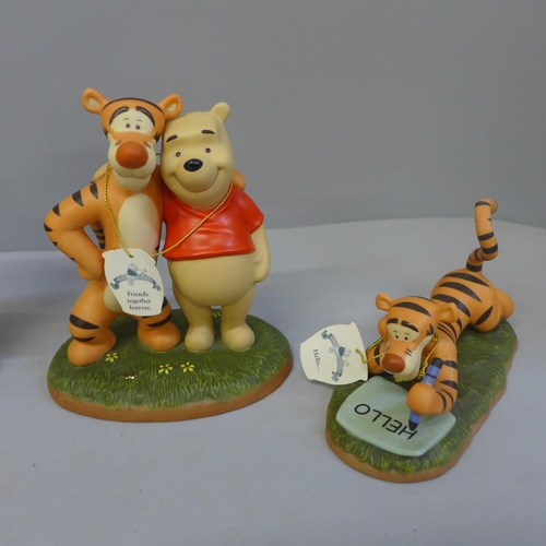 604 - Four Winnie The Pooh figures, Hello...., Friends Together Forever, Ta-Ta For Now and Your Smile Is M... 