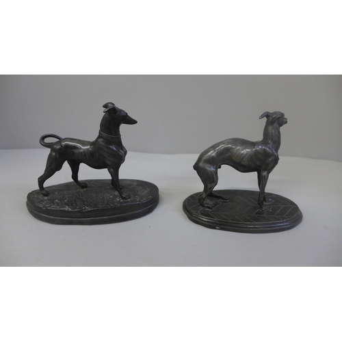 606 - Two spelter figures of whippet dogs on oval bases, tallest 11cm