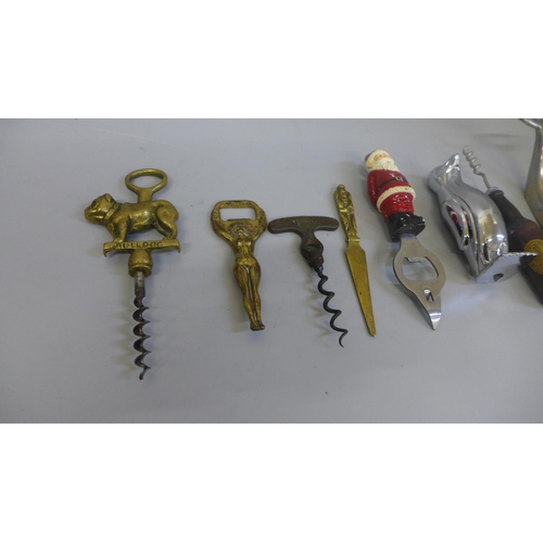 630 - A collection of novelty bottle openers and corkscrews