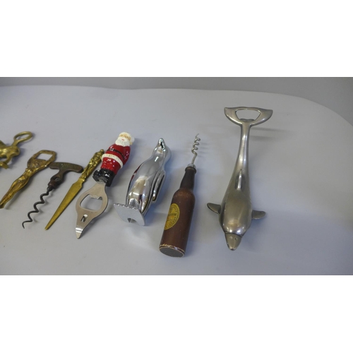 630 - A collection of novelty bottle openers and corkscrews