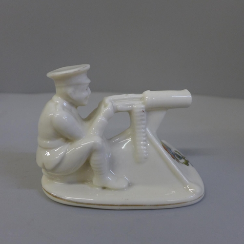 633 - Two items of crested china, a WWI tank and Tommy with machine gun