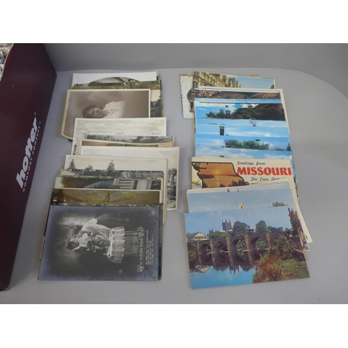 717 - A collection of postcards, vintage to modern