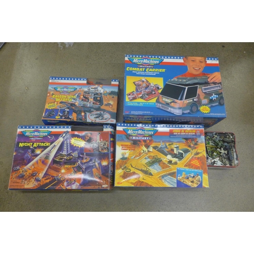 744 - A collection of Micro Machines toys (4), and some loose