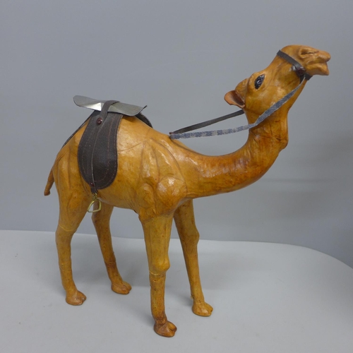 766 - A leather covered model of a camel