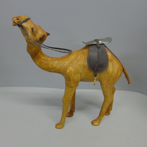 766 - A leather covered model of a camel