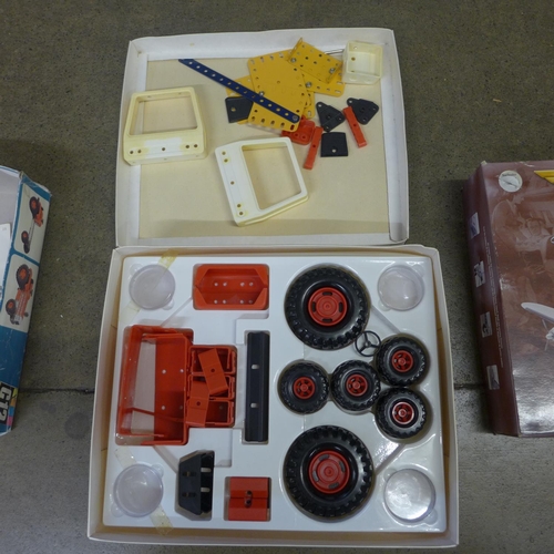 784 - Two Constructo C12 tractor sets, boxed and a Corgi Classics aircraft, boxed