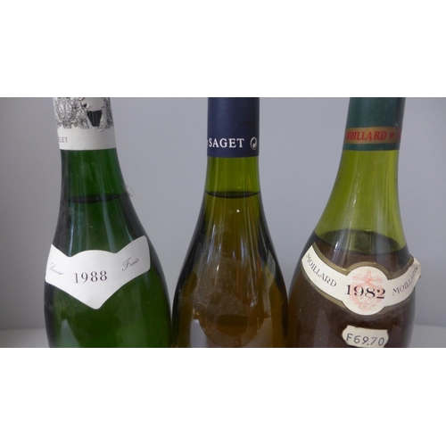 820 - Two bottles of Pouilly Fume vintage wine, one 1988 and a bottle of Pouilly-Fuisse, 1982