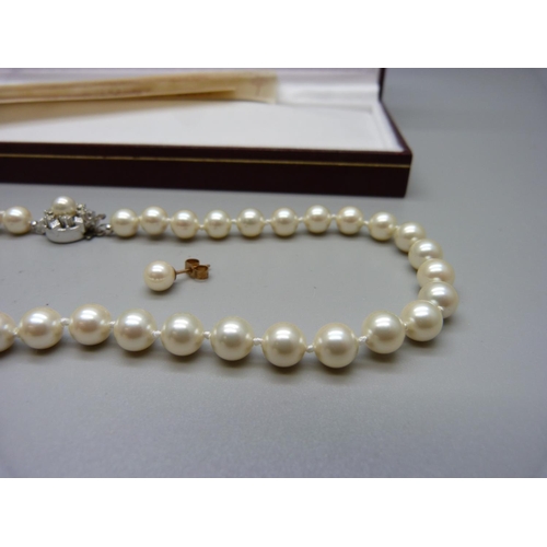 874 - A Shima faux pearl necklace and a pair of 9ct gold faux pearl earrings