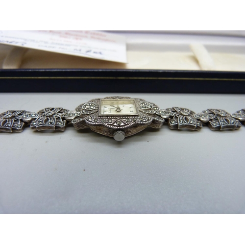 885 - A lady's silver and marcasite cocktail wristwatch