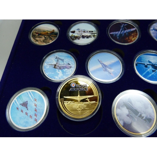 886 - A cased set of Royal Air Force mint coins with pictures of aircraft